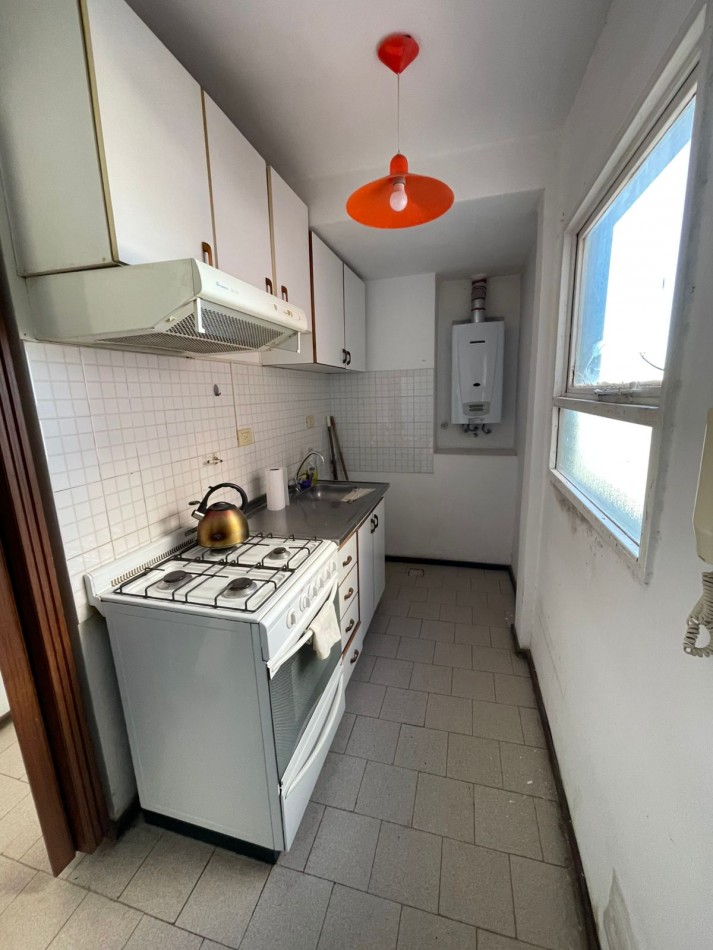 SE VENDE DEPARTAMENTO DE DOS DORMITORIOS CON COCHERA Y BALCON ZONA B SAN MARTIN SEGURIDAD 24 HR